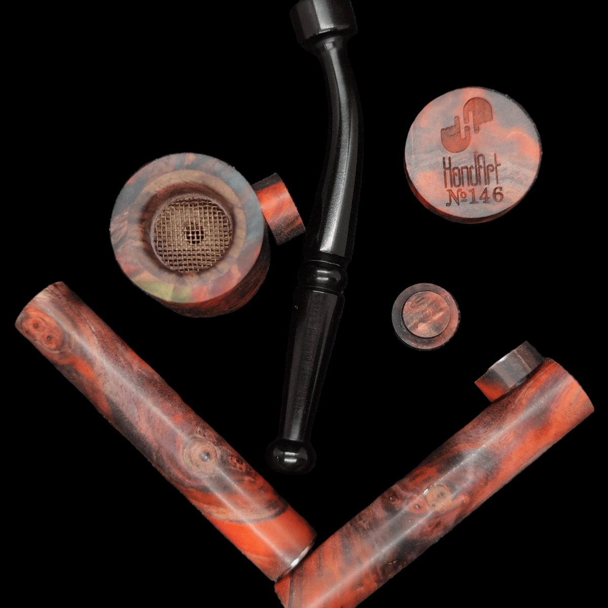 Collection of Чандарт smoking pipe нумбер 146 with a black background